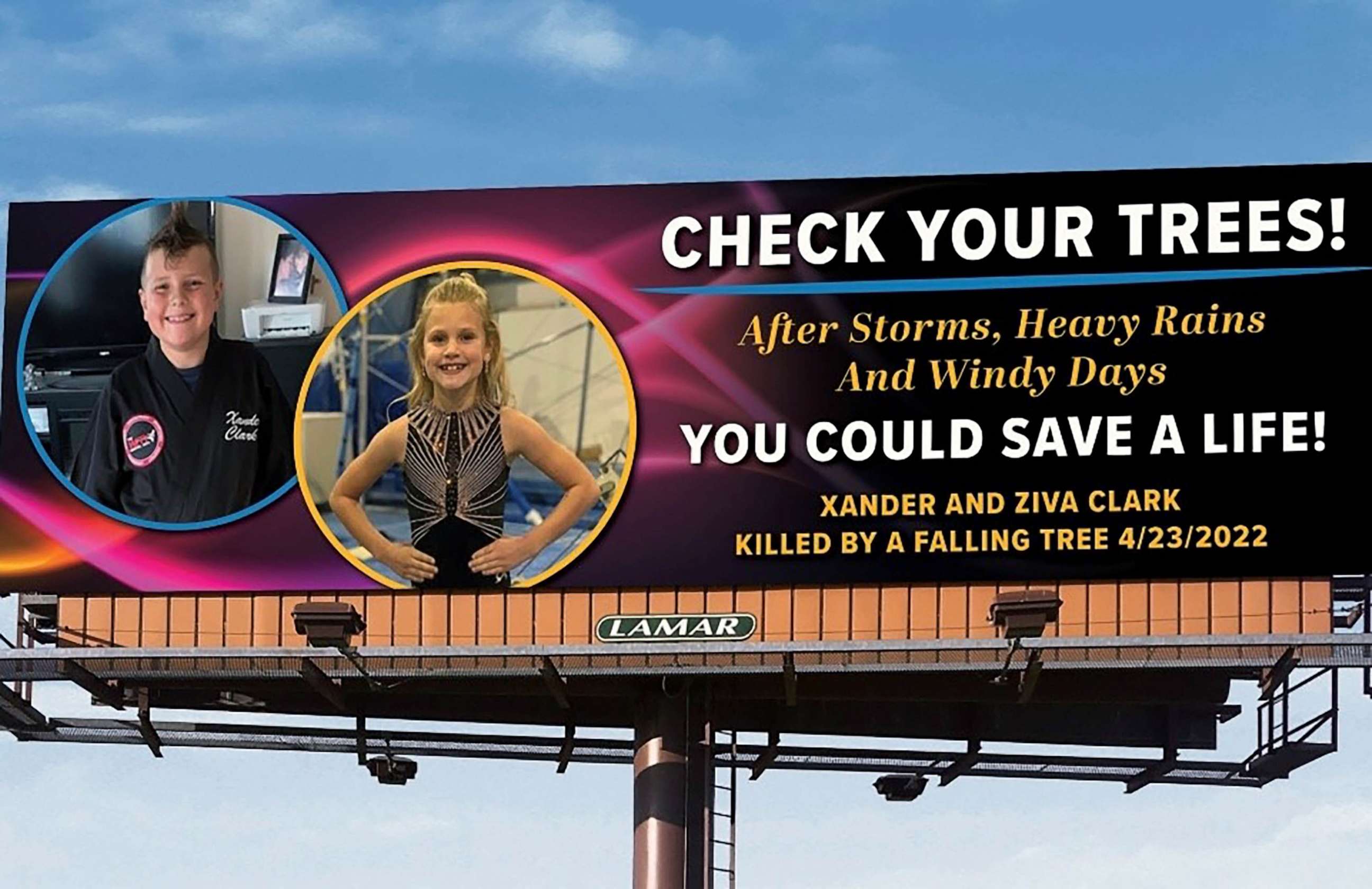PHOTO: Brian and Crystal Clark decided to rent a billboard to raise awareness of falling trees after their two children were struck by a falling tree and died last year.
