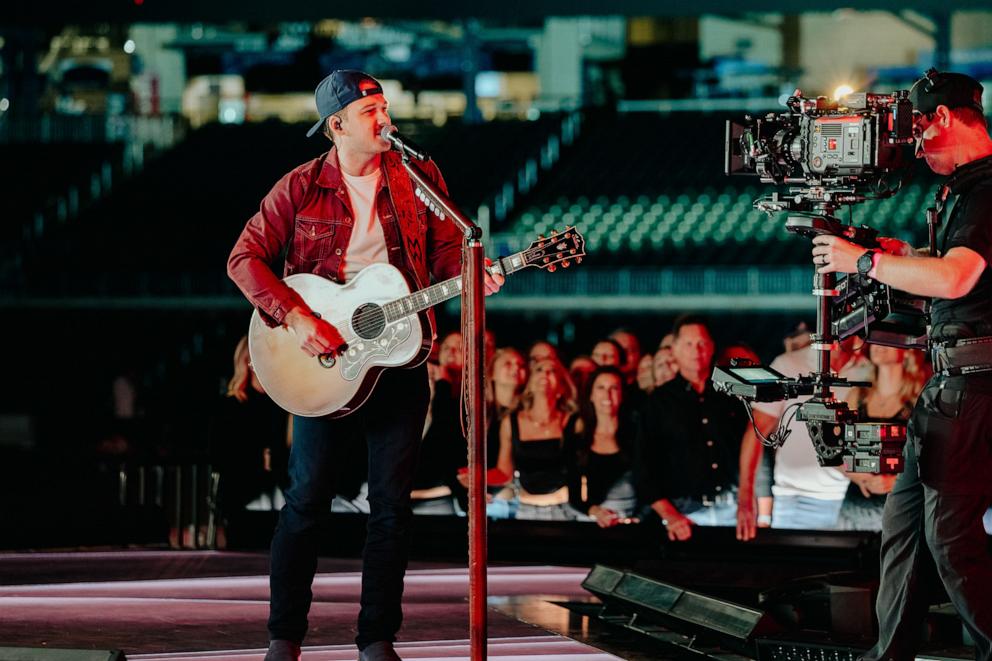 PHOTO: Morgan Wallen performs at the 2023 Billboard Music Awards.