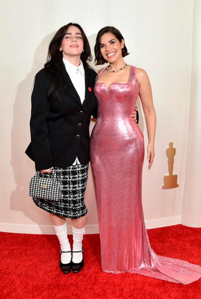 PHOTO: Billie Eilish, left, and America Ferrera arrive at the Oscars on March 10, 2024, at the Dolby Theatre in Hollywood.