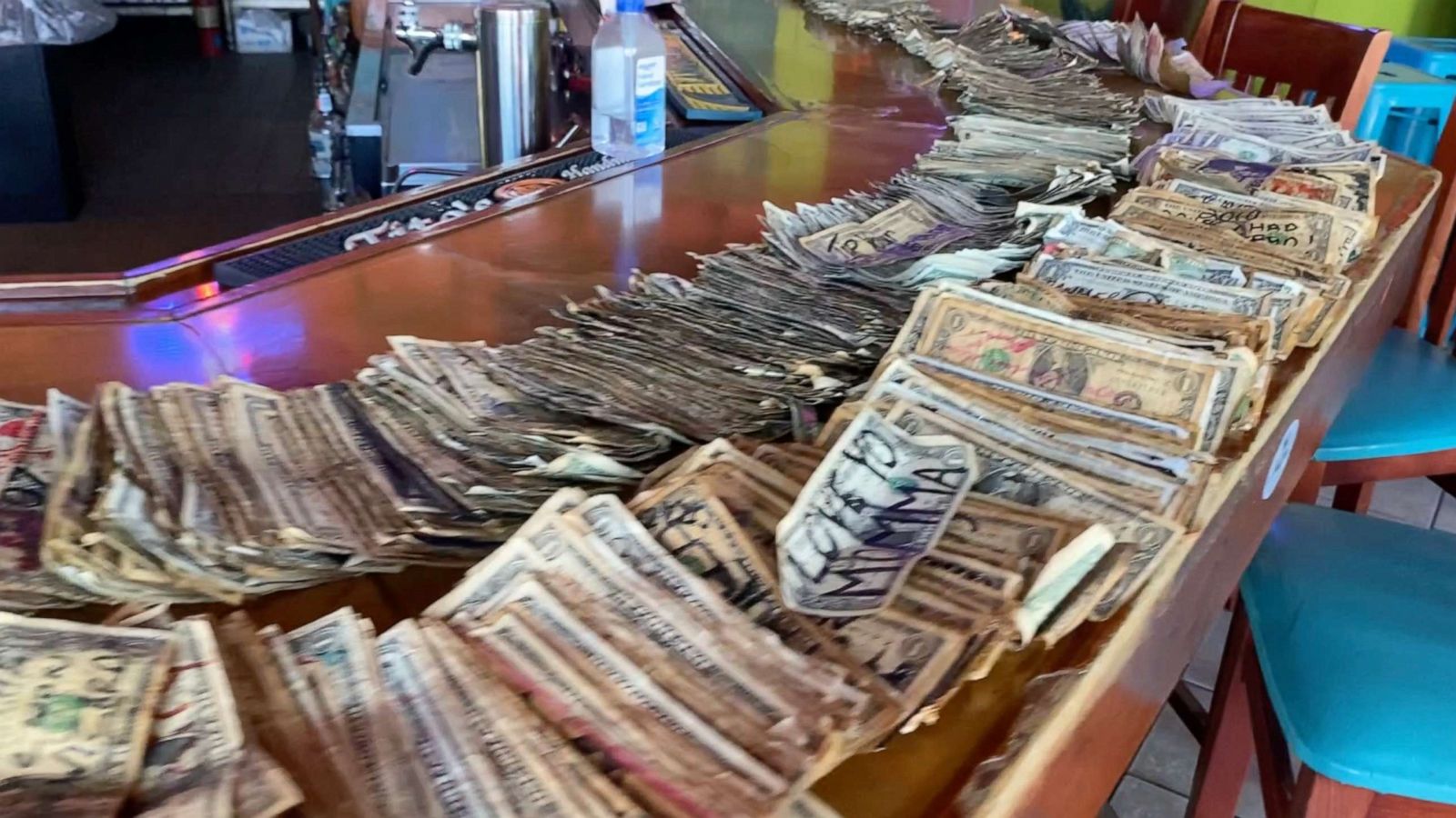 PHOTO: Jennifer Knox removed $3,714 in bills from the walls of her Tybee Island, Georgia bar to give to unemployed staff.