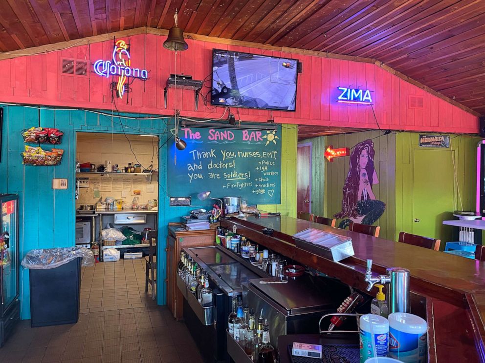 PHOTO: Jennifer Knox removed $3,714 in bills from the walls of her Tybee Island, Georgia bar to give to unemployed staff.