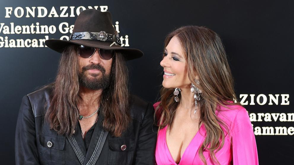 PHOTO: Billy Ray Cyrus and Elizabeth Hurley attend the "Orizzonti | Rosso" Exhibition Opening Dinner at Palazzo Barberini, on May 24, 2025, in Rome.