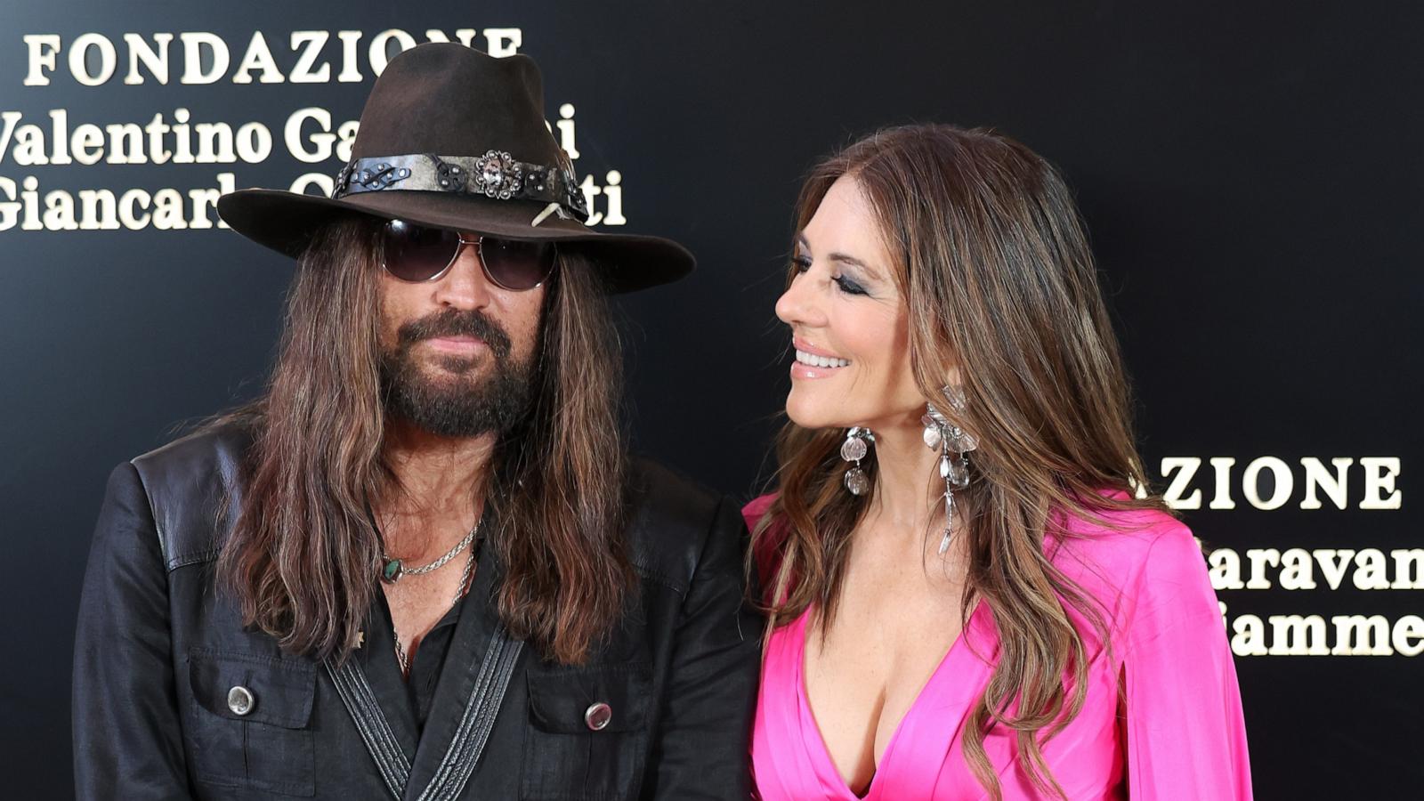 PHOTO: Billy Ray Cyrus and Elizabeth Hurley attend the "Orizzonti | Rosso" Exhibition Opening Dinner at Palazzo Barberini, on May 24, 2025, in Rome.