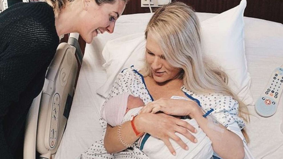 PHOTO: PJ Willis holds Jarrell Clayton Hepler, the newborn son of her sister-in-law, Hollie Jo Hepler, left.