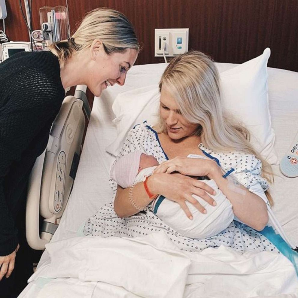 PHOTO: PJ Willis holds Jarrell Clayton Hepler, the newborn son of her sister-in-law, Hollie Jo Hepler, left.