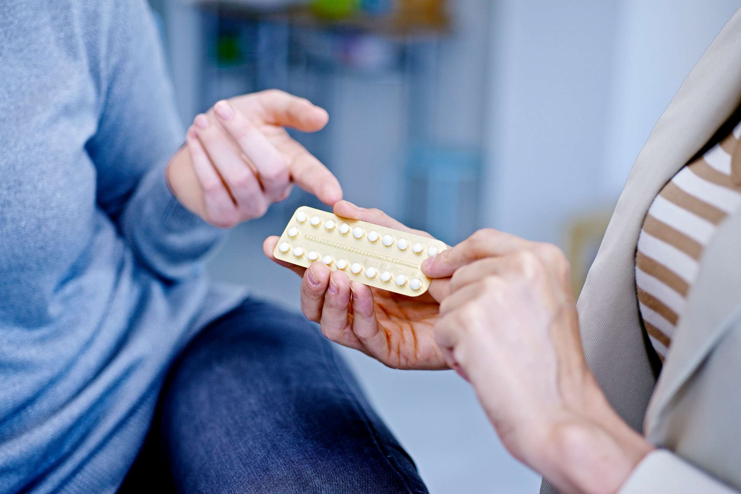 PHOTO: A stock photo of a doctor discussing oral contraception with a patient.