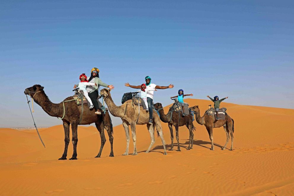 PHOTO: Karen Akpan and her family in the Sahara Desert. 