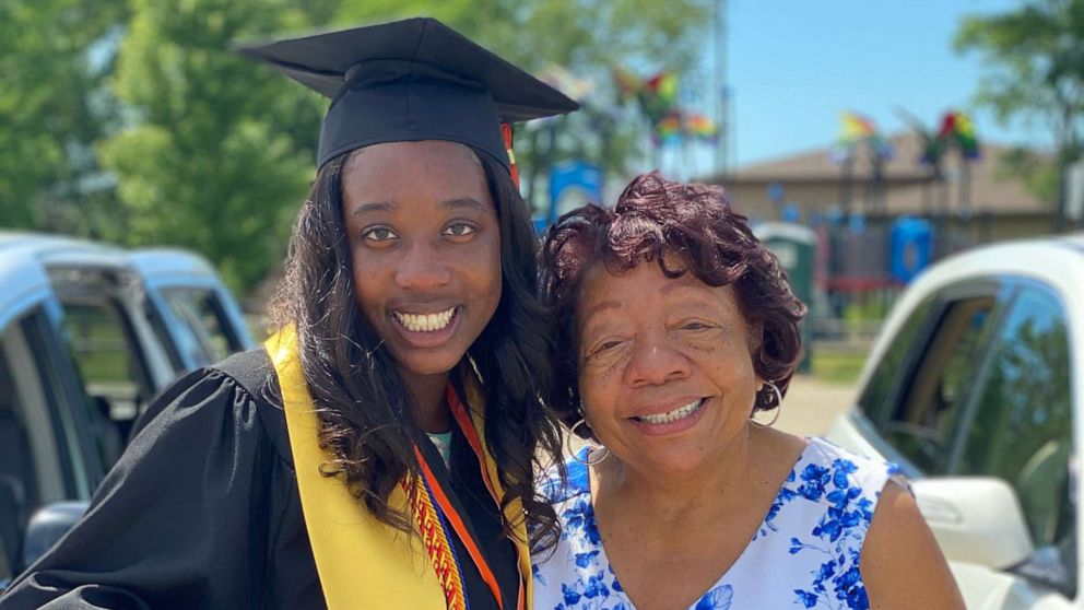 PHOTO: Nina Mitchell, 17, valedictorian of DeKalb High School in DeKalb, Illinois, stands with her grandmother, Pearlene Carter, 75, was also a valedictorian representing Walker High School's class of 1959 in Coldwater, Mississippi.