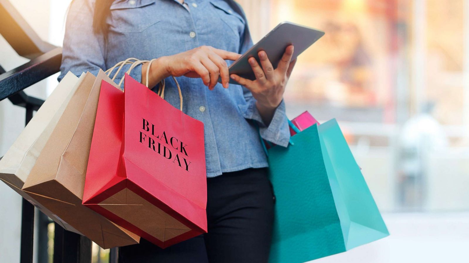 PHOTO: A woman is pictured holding shopping bags at the mall in this undated stock photo.