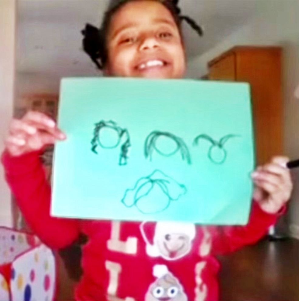PHOTO: Morgan Bugg, 7, from Brentwood, Tennessee, holding up four hairstyle options she drew for Freckle.