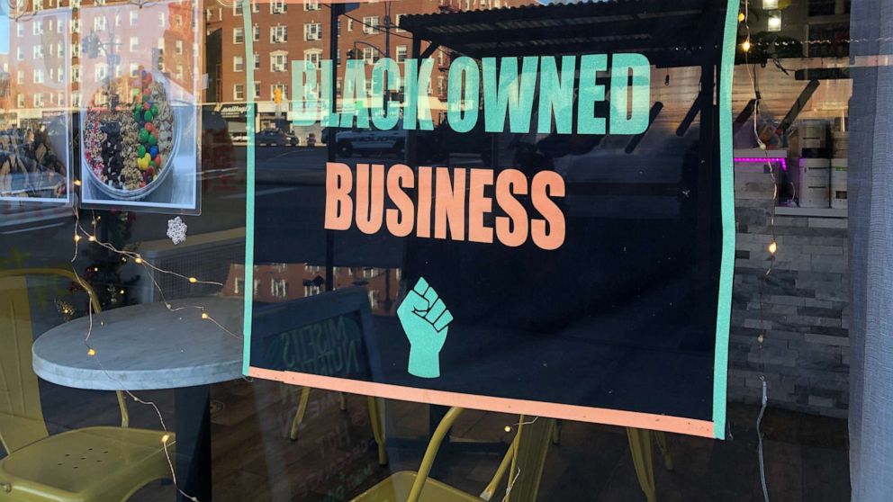 PHOTO: In this April 7, 2021, file photo, a Black Owned Business sign is showin in the window of MisFits Nutrition, in Queens, New York. 