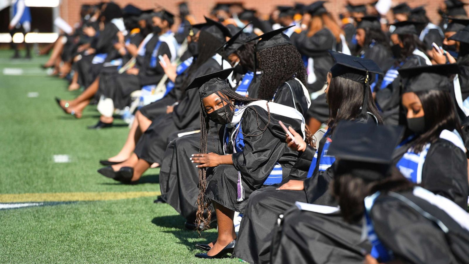 PHOTO: Spelman College graduates participate in 2020 & 2021 Spelman College Commencement on May 16, 2021 in Atlanta.