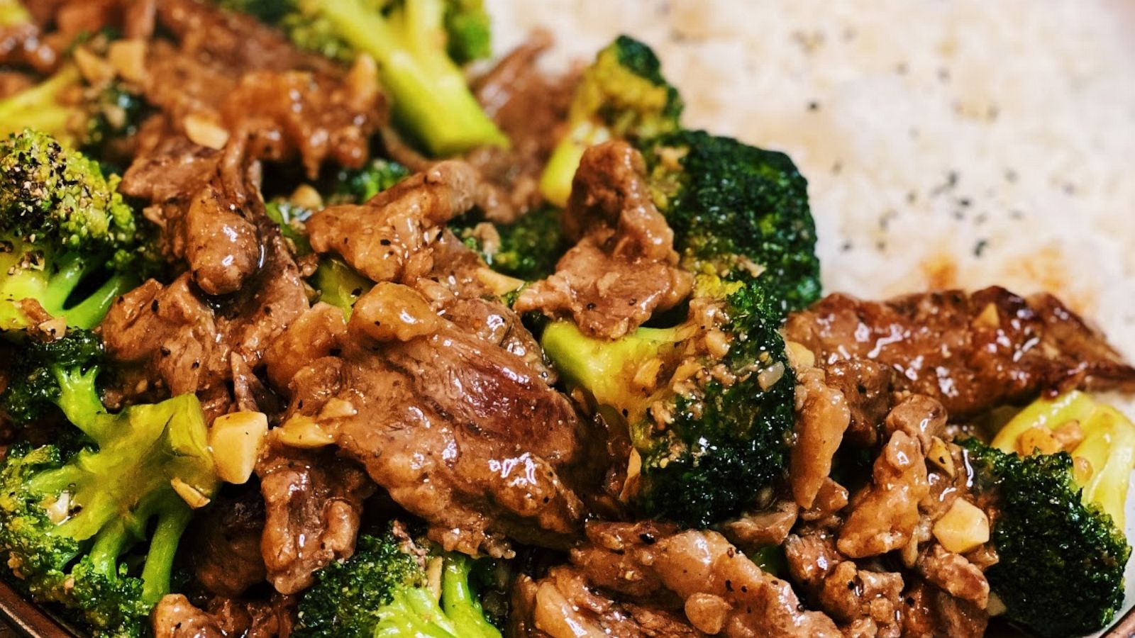 PHOTO: Black pepper beef sauteed with broccoli served over white rice.