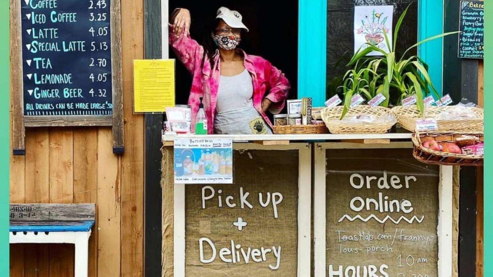 PHOTO: Blew Kind stands at the counter of Franny Lou's Porch to serve her community.