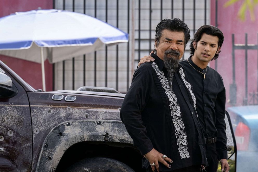 PHOTO: George Lopez as Uncle Rudy and Xolo Mariduena as Jaime Reyes in Warner Bros. Pictures’ action adventure “Blue Beetle.”