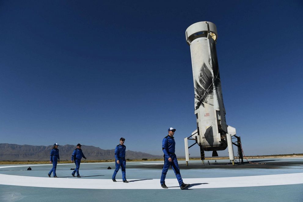 PHOTO: Blue Origins Vice President of Mission & Flight Operations Audrey Powers, actor William Shatner, Planet Labs co-founder Chris Boshuizen, and Medidata Solutions Co-Founder Glen de Vries, arrive at the New Shepard rocket landing pad on Oct. 13, 2021.