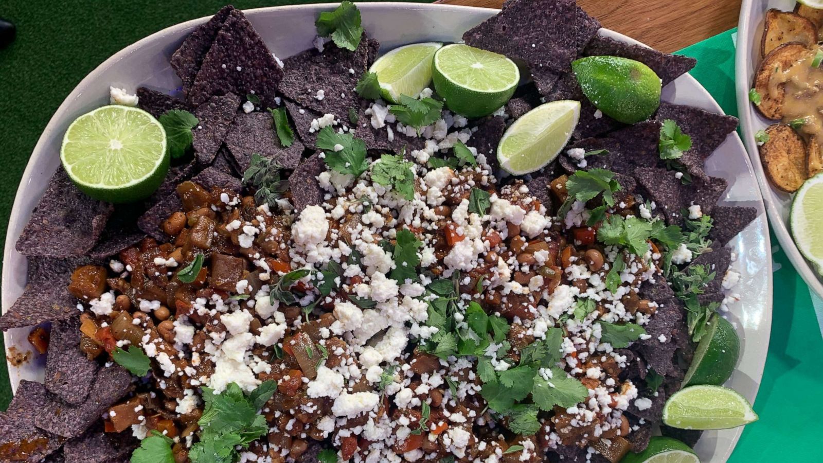 PHOTO: Chef Michael Symon's blue corn nachos with eggplant.