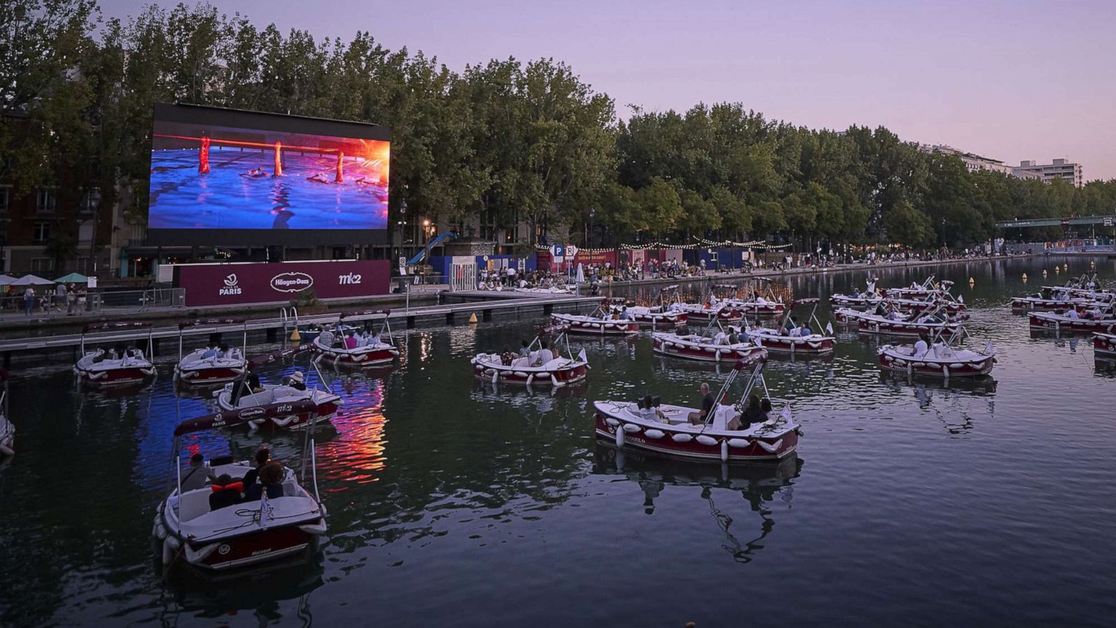 PHOTO: The opening night of Paris Plages "Le Cinema Sur L'Eau", a free floating cinema at La Villette, July 18, 2020, in Paris.