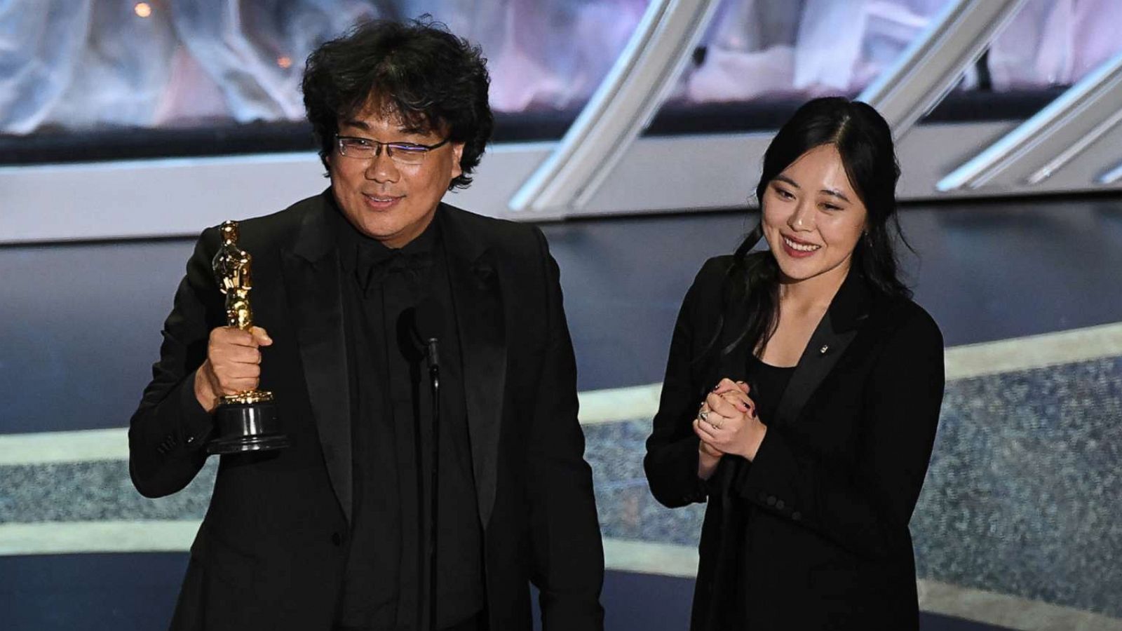 PHOTO: Bong Joon-ho accepts the International Feature Film award for 'Parasite' with interpreter Sharon Choi onstage during the 92nd Annual Academy Awards at Dolby Theatre, Feb. 9, 2020, in Hollywood, Calif.