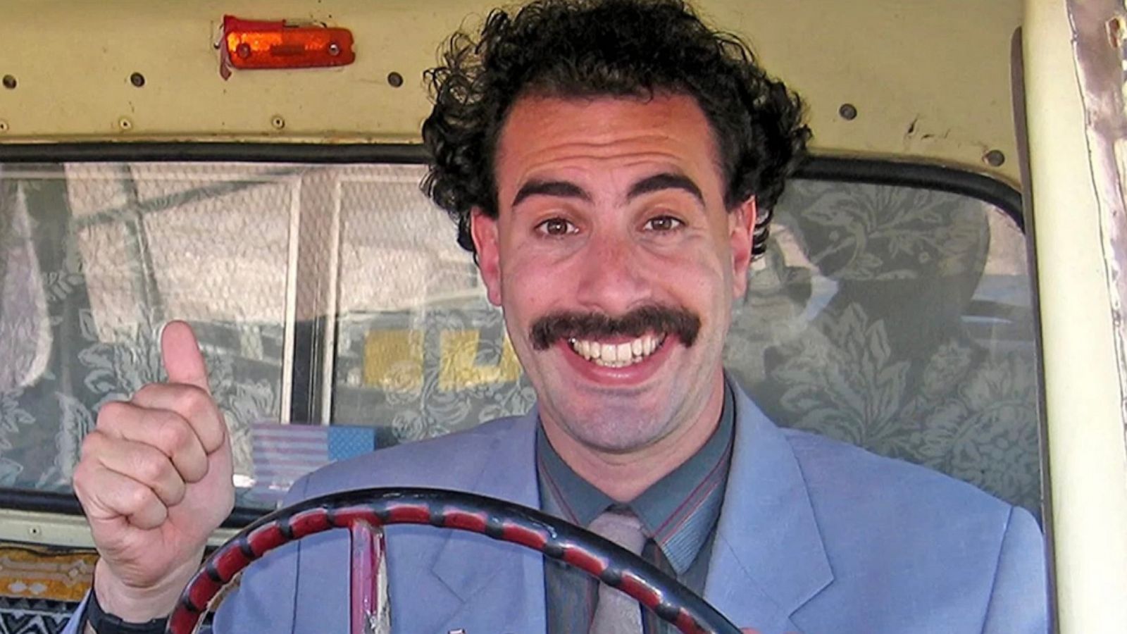 PHOTO: Sacha Baron Cohen in a scene from "Borat Subsequent Moviefilm: Delivery of Prodigious Bribe to American Regime for Make Benefit Once Glorious Nation of Kazakhstan."