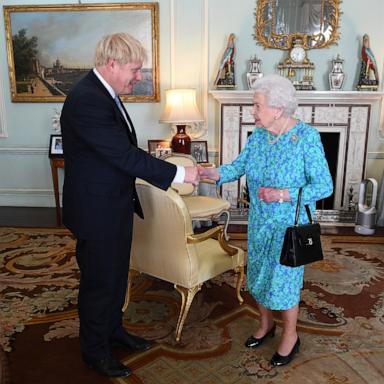 PHOTO: In this July 24, 2019, file photo, Queen Elizabeth II welcomes newly elected leader of the Conservative party, Boris Johnson at Buckingham Palace in London.