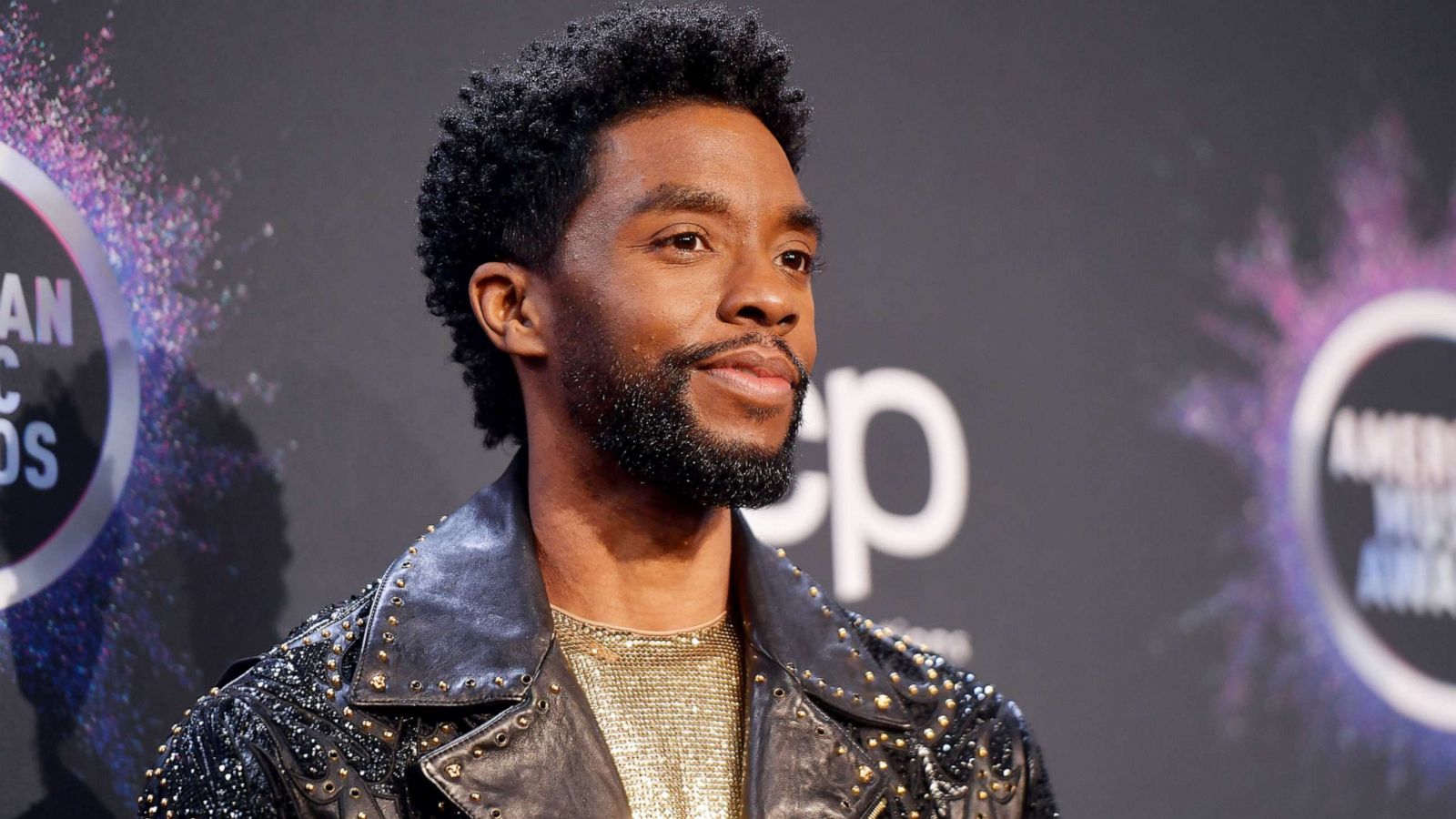 PHOTO: Chadwick Boseman poses in the press room during the 2019 American Music Awards at Microsoft Theater, Nov. 24, 2019, in Los Angeles.