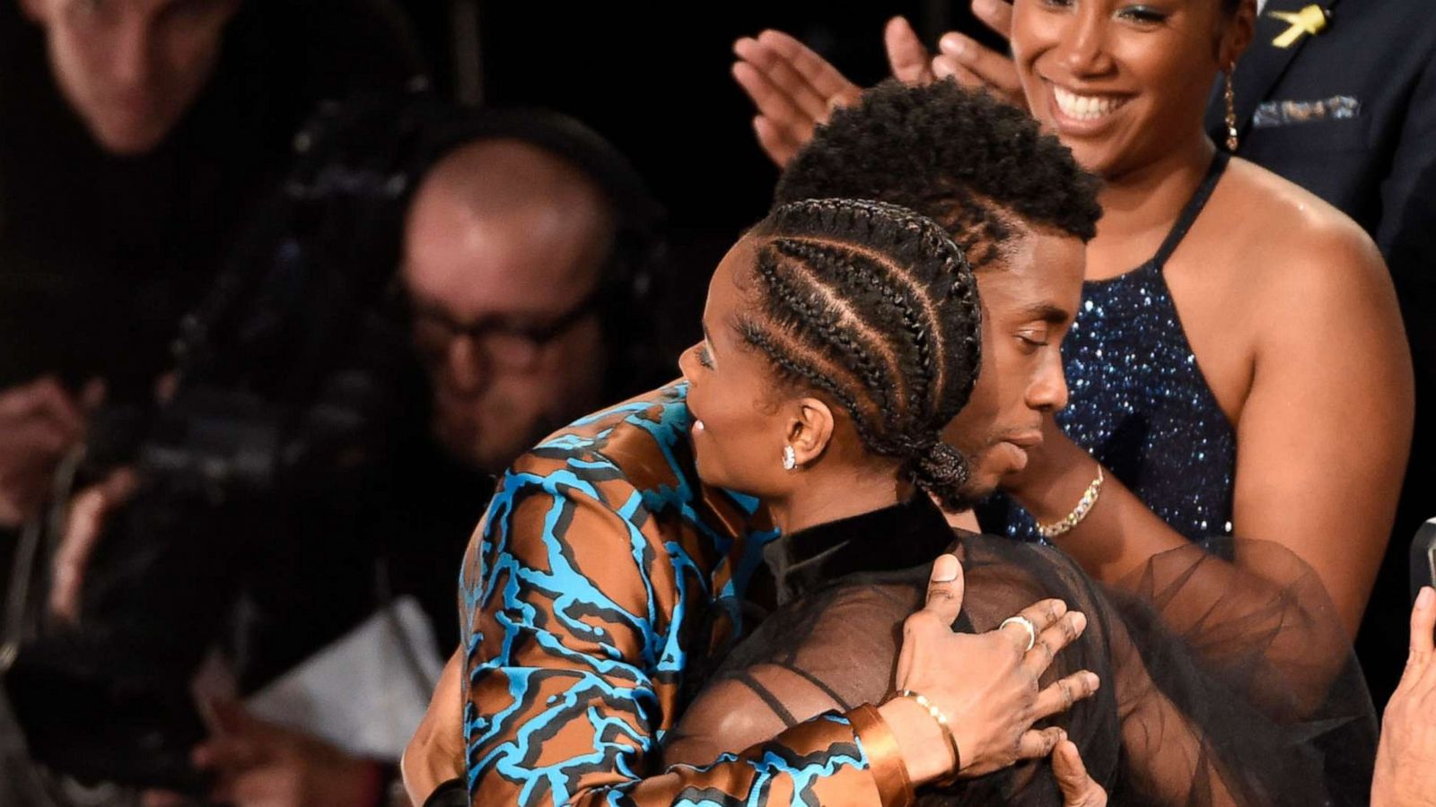 PHOTO: Chadwick Boseman congratulates Letitia Wright before she accepts the award for outstanding breakthrough performance in a motion picture for "Black Panther" at the 50th annual NAACP Image Awards in Los Angeles, March 30, 2019.