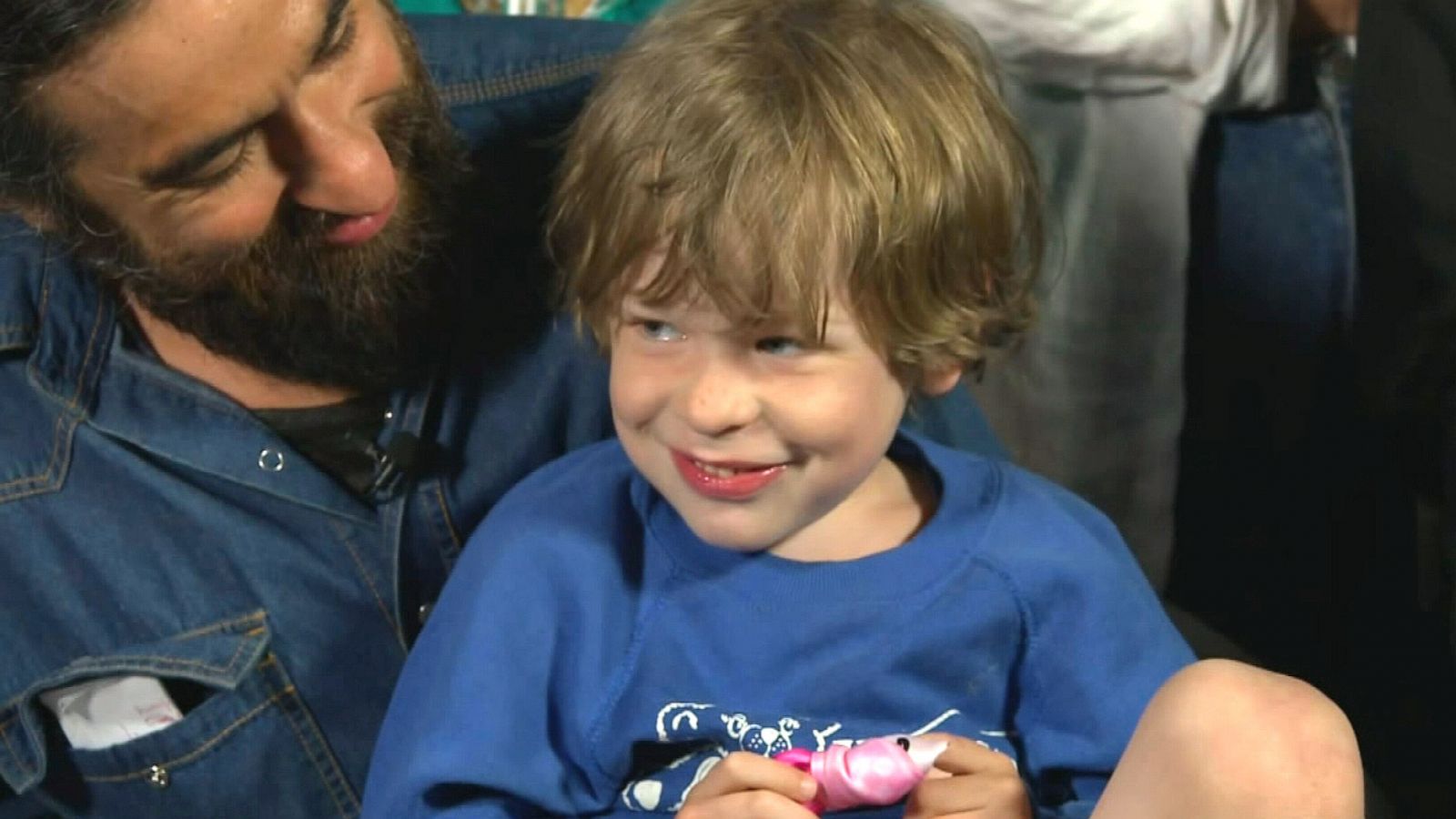 PHOTO: Ben Crawford holds his son Rainier Crawfor during an interview for ABC's "Good Morning America" airing on May 6, 2022.