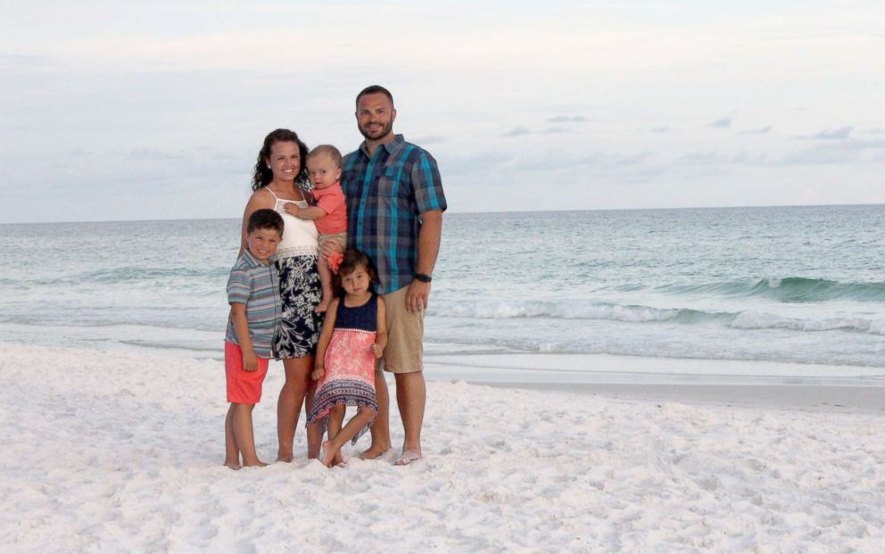 PHOTO: Adam and Whitney Dinkel of Overland Park, Kansas, seen in a photo while vacationing in Florida with their children, Layton, 6, Gracelyn, 4 and Roman, 2.