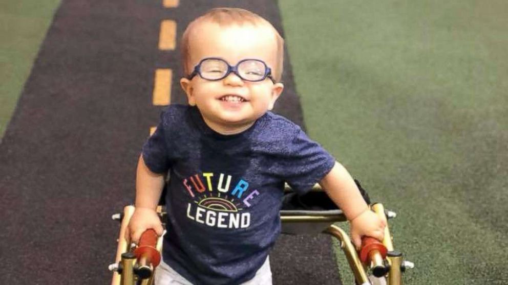 PHOTO: Roman Dinkel, 2, who was born with spina bifida, went viral after sharing the celebratory moment with his dog of him using crutches without assistance.