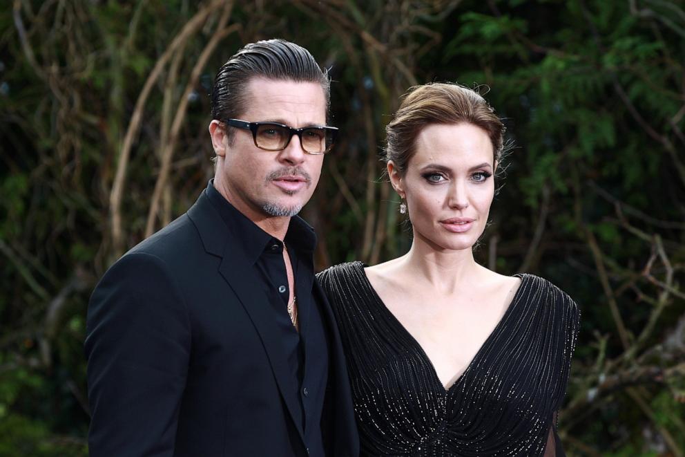 PHOTO: Brad Pitt and Angelina Jolie attend a private reception as costumes and props from Disney's "Maleficent" are exhibited in support of Great Ormond Street Hospital at Kensington Palace, May 8, 2014, in London.