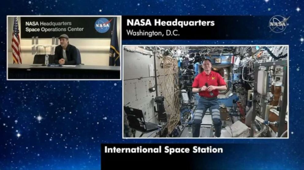 PHOTO: Brad Pitt talks with NASA astronaut Nick Hague, who is speaking from the ISS.