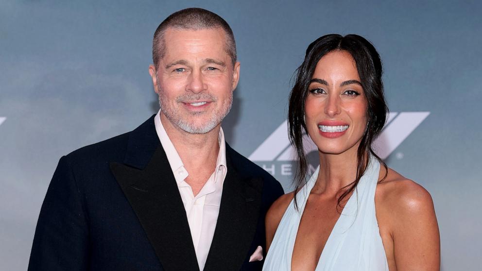 PHOTO: Brad Pitt and Ines de Ramon attend the World Premiere of F1 The Movie in Times Square, June 16, 2025 in New York City.