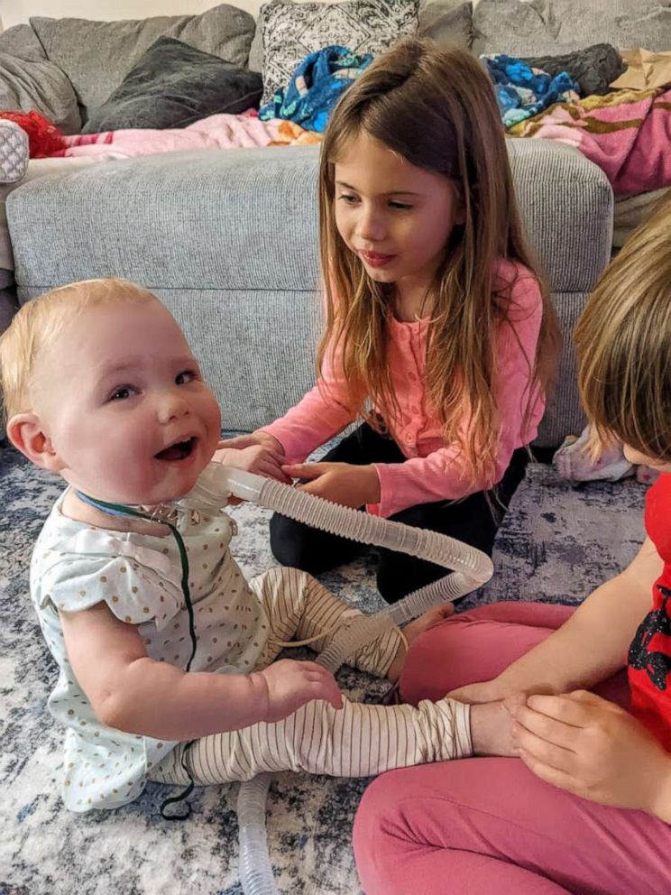 PHOTO: Bradi Foster plays with her two big sisters at home after spending 19 months hospitalized in the NICU.