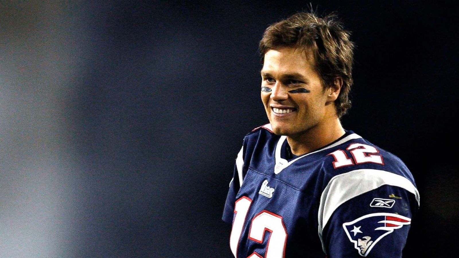 PHOTO: Tom Brady #12 of the New England Patriots waits to congratulate teammate Matt Cassel after he scored a touchdown in the fourth quarter against the Washington Redskins on October 28, 2007 at Gillette Stadium in Foxboro, Mass.