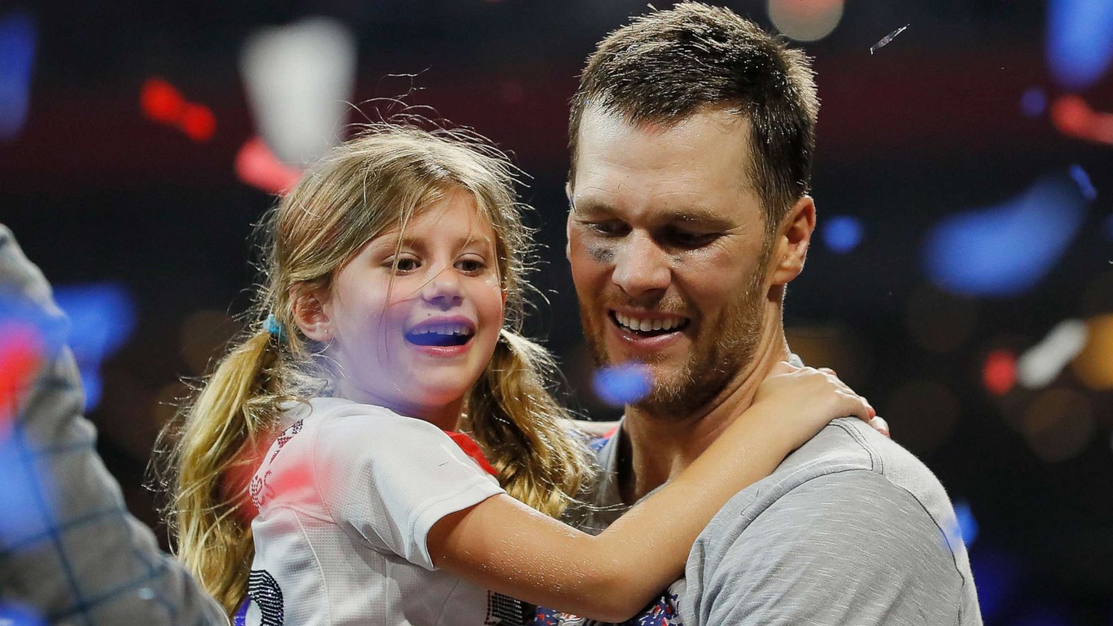 PHOTO: Tom Brady of the New England Patriots carries his daughter Vivian Lake Brady at the end of the Super Bowl LIII at Mercedes-Benz Stadium on Feb. 3, 2019 in Atlanta.