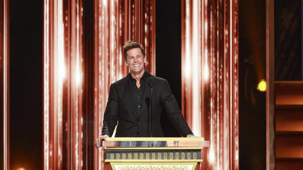 PHOTO: Tom Brady speak onstage during G.R.O.A.T The Greatest Roast Of All Time: Tom Brady for the Netflix is a Joke Festival at The Kia Forum on May 5, 2024 in Inglewood, Calif.