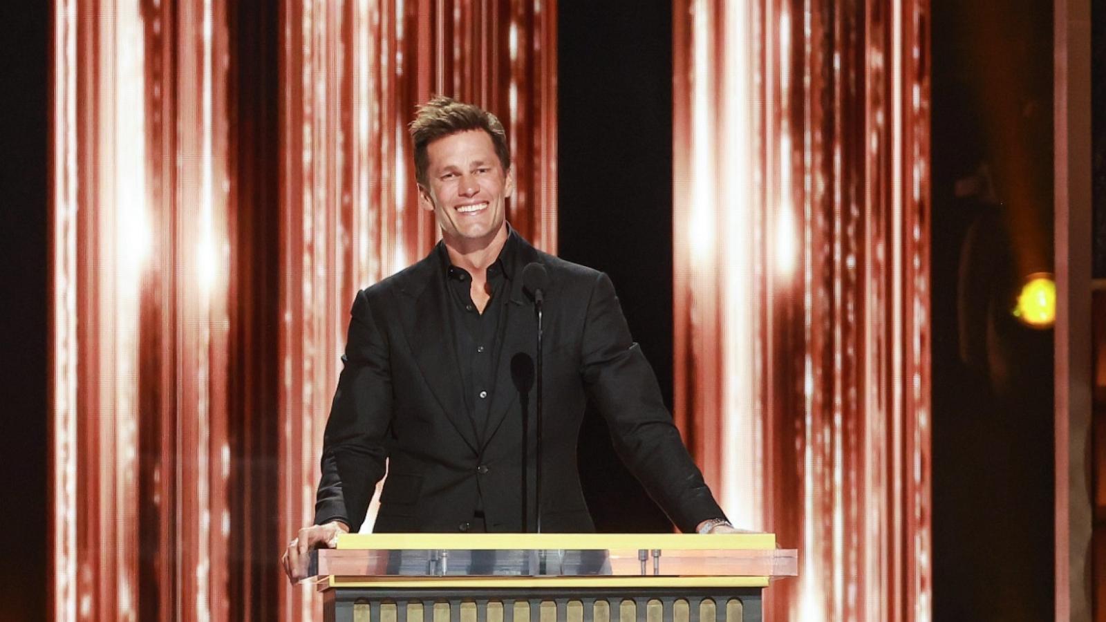 PHOTO: Tom Brady speak onstage during G.R.O.A.T The Greatest Roast Of All Time: Tom Brady for the Netflix is a Joke Festival at The Kia Forum on May 5, 2024 in Inglewood, Calif.