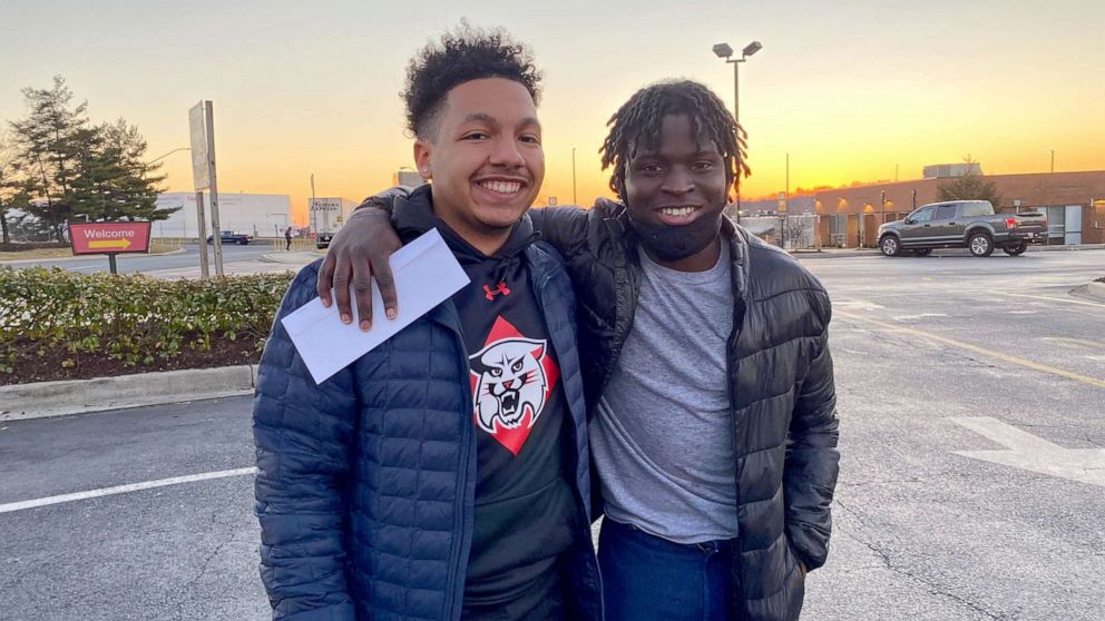 PHOTO: Davidson College student Brandon Harris, left, is pictured with his childhood friend Sura Sohna just after Sohna was released from a Maryland prison 12 years early.