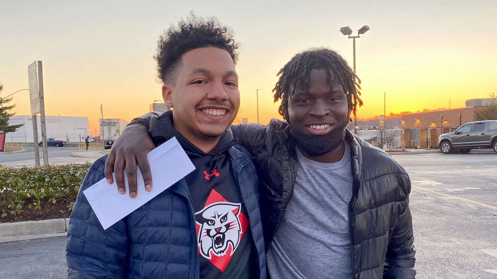 PHOTO: Davidson College student Brandon Harris, left, is pictured with his childhood friend Sura Sohna just after Sohna was released from a Maryland prison 12 years early.