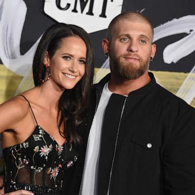 PHOTO: Brantley Gilbert (L) and Amber Cochran attend the 2018 CMT Music Awards at Bridgestone Arena on June 6, 2018 in Nashville, Tenn.  