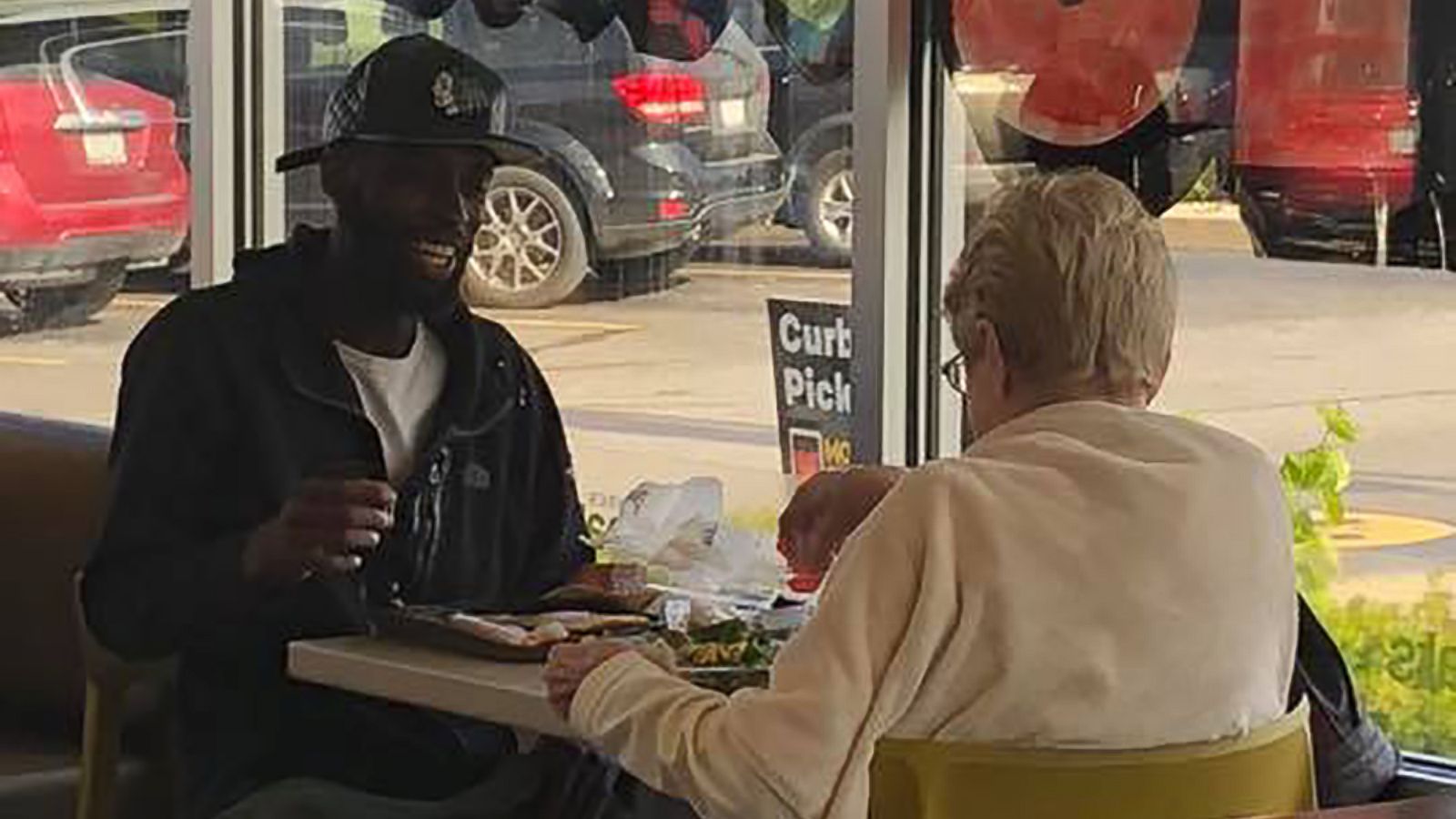 PHOTO: Two strangers were captured enjoying breakfast together after a woman asked Eric Haralson, 28, of Noblesville, Ind. if she could sit down and eat with him at a McDonald's located in Noblesville, Ind.