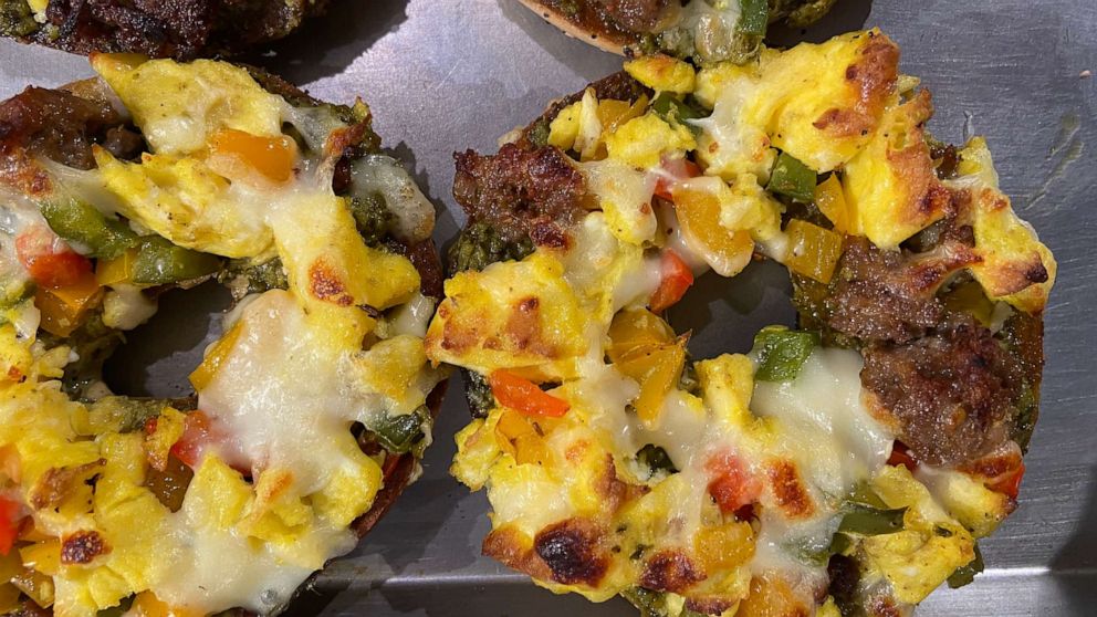 PHOTO: Bagel breakfast pizzas with scrambled eggs, sausage and veggies. 