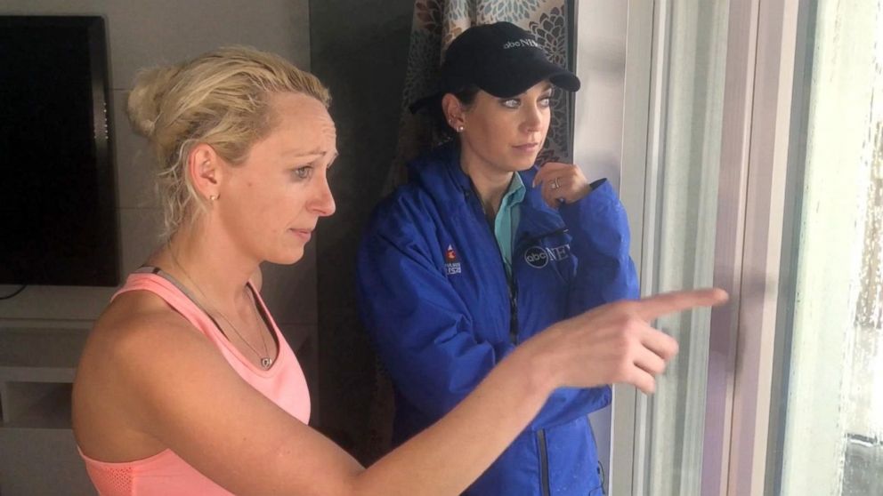 PHOTO: Kimberly Kennedy, left, points to devastated areas after Hurricane Michael swept through Mexico Beach, Fla.