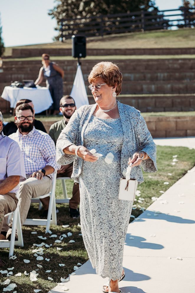 PHOTO: Joyce Raby walks down the aisle at her grandson's wedding in Tennessee. 