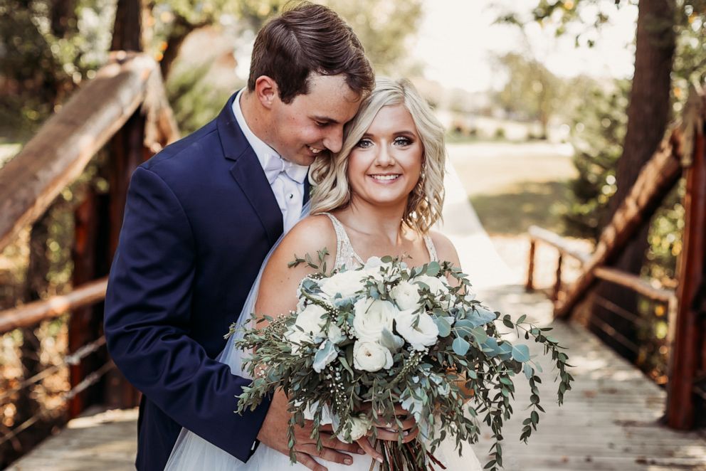 PHOTO: Lyndsey and Tanner Raby pose on their September 22, 2019, wedding day in in Benton, Tennessee.