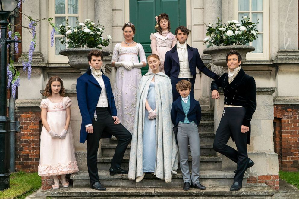 PHOTO: Bridgerton's Florence Hunt as Hyacinth, Luke Newton as Colin, Ruth Gemmell as Lady Violet, Phoebe Dynevor as Daphne, Claudia Jessie as Eloise, Jonathan Bailey as Anthony, Will Tilston as Gregory and Luke Thompson as Benedict, available on Netflix.