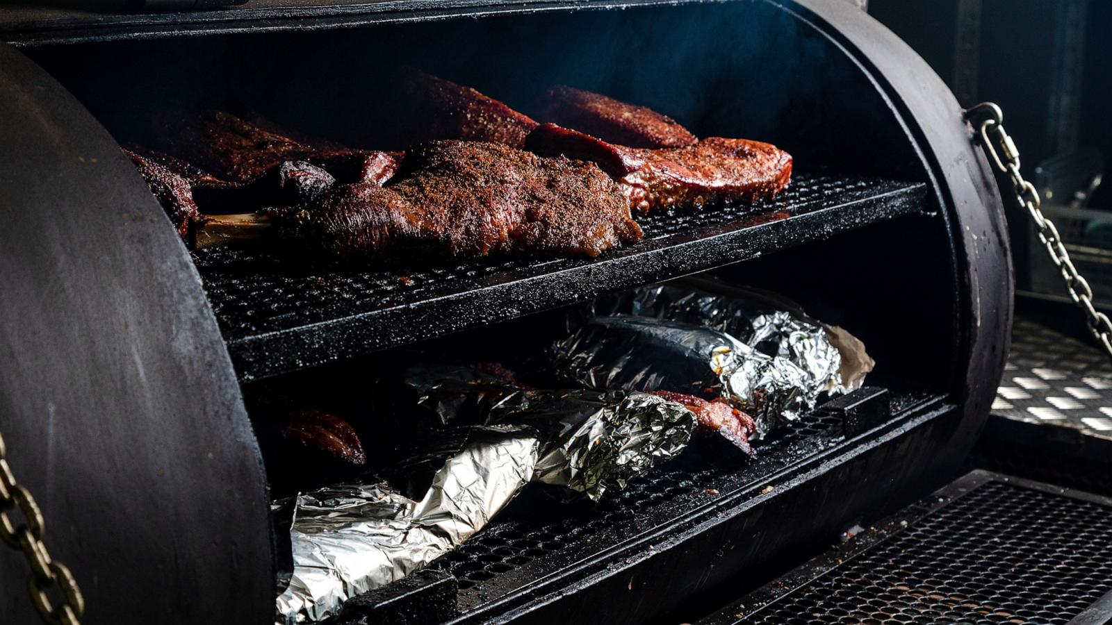 PHOTO: beef is smoked in smoker.