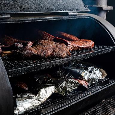 PHOTO: beef is smoked in smoker.