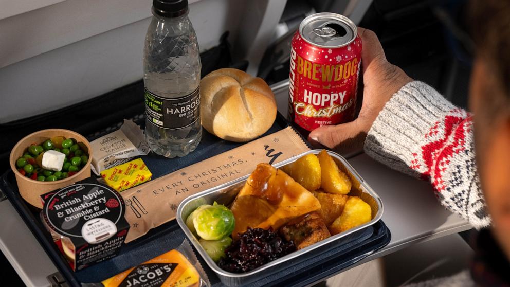 PHOTO: A Christmas turkey dinner in World Traveller is enjoyed with a can of BrewDog's Hoppy Christmas IPA.